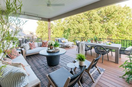 Design by Scout & Nimble | Photo by Emily Sewell | SHOP THE LOOK: Senora Dining Table, Canaveral Cape Dining Arm Chair, Julian Outdoor Chair, Monterey Outdoor Sofa, Isle Outdoor Rug, Dimitri Double Day Bed, Frisco End Tables, Classic Trivet with Lazy Susan Top