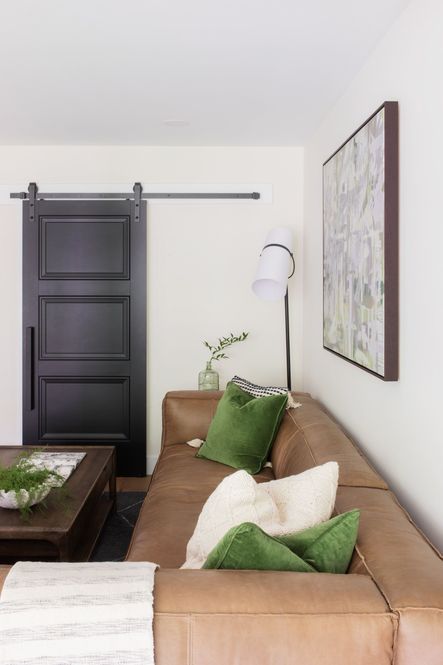 SHOP THE LOOK: Nolita Sectional, Safflower Green Velvet Pillow, Valeria Coffee Table, Banded Shade Floor Lamp, Naomi End Table, Rhapsody in Green Art