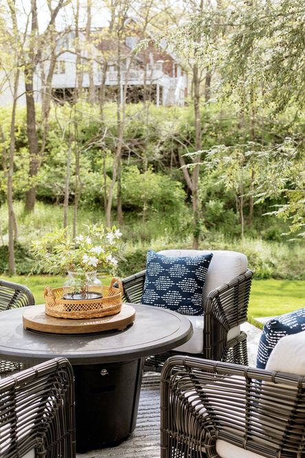 SHOP THE LOOK: Carver Lounge Chair, Pera Indigo Outdoor Pillow, Jenna Woven Tray Set