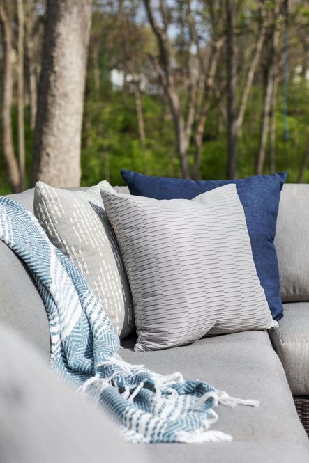 SHOP THE LOOK: Wren Blue & White Throw, Storm Navy Outdoor Pillow, Caplin Light Gray Outdoor Pillow