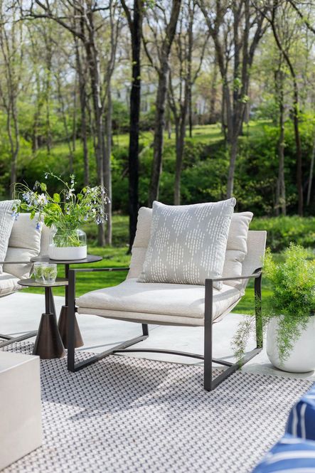 SHOP THE LOOK: Avon Sling Chair, Pera Stone Outdoor Pillow Set, Frisco End Tables
