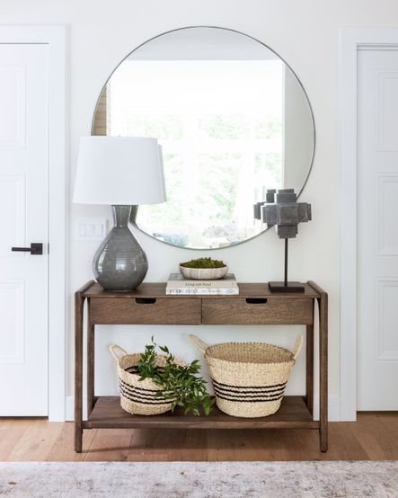 SHOP THE LOOK | Valeria Console Table, Glen Mirror, Ash Table Lamp, Liverpool Rug, Black Marble Sculpture, Galaxy Marble Bowl, Seagrass Baskets