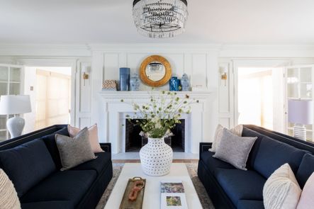 SHOP THE LOOK: Blanche Throw Pillow, Porous Vase, Anastasia Silver/Plum Rug, Helena Sofa, Vintage Sea Glass Beads, Abbott Tray, Petal Mirror, Monroe 1 Light Sconce, Denim Blue Umbrella Vase, Blue &amp; White Chain Temple Jar, Persian Box Set, Marble Box &amp; Lid, Darla Ceramic Table Lamp, Rayas Table Lamp