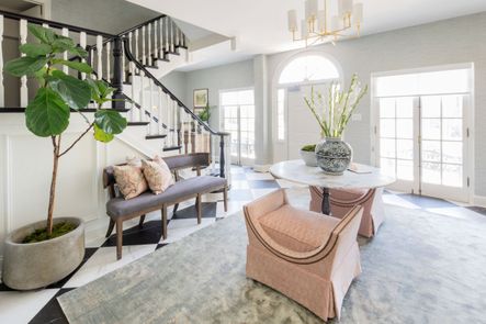 SHOP THE LOOK: Carter Dining Bench, Lucy Dining Table, Gayle Bench, Dillon Chandelier, Blue & White Yuan Sunflower Jar, Busan White Orchid Bowl, Tribeca Planter