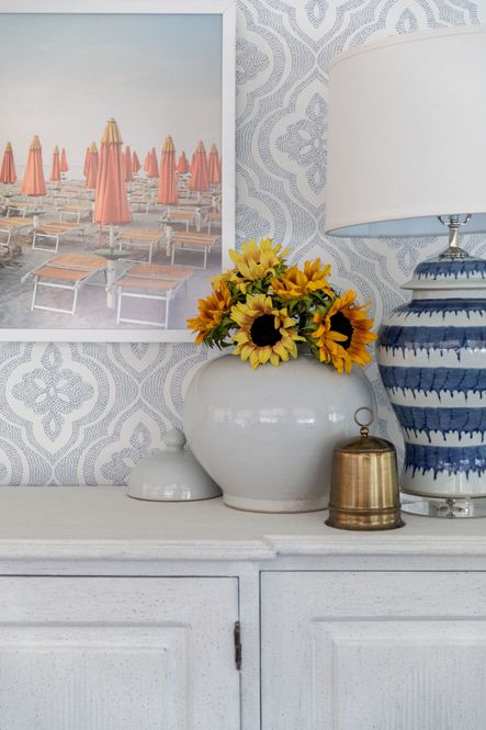 SHOP THE LOOK: Antique Brass Bells, Large Ceramic Bowl, Ellington Sideboard, Marina Di Ravenna At Dusk, Blue & White Drip Table Lamp, Busan Ginger Jar