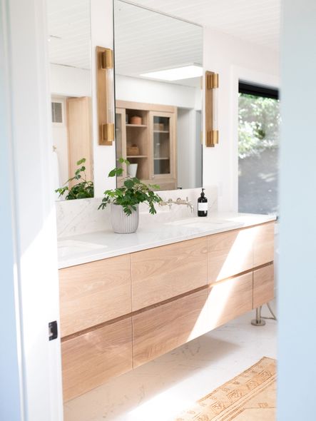 Let there be natural light! The skylight—visible in the mirror—is an unexpected but beautiful addition to this master bath