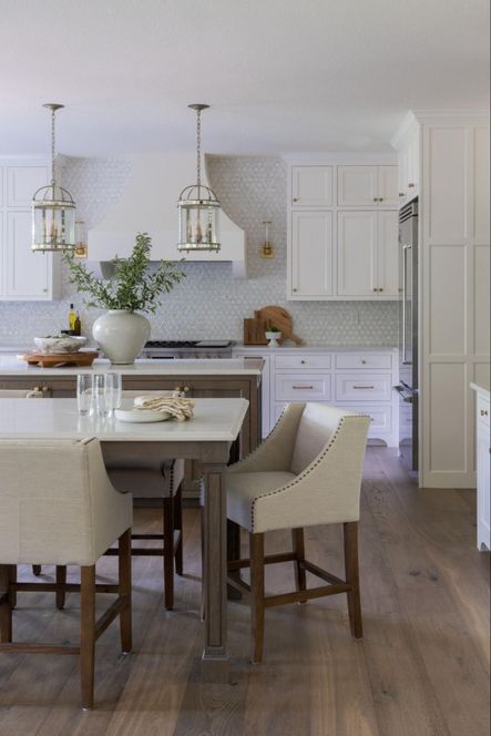Design by Bodine White | Photography by Scout &amp; Nimble | SHOP THE LOOK: Corsica Small Silver Lantern, Winston Burnished Oak Upholstered Counter Stool