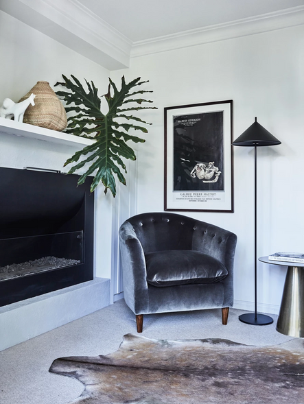 A small sitting area near the fireplace creates the perfect spot to cozy up with a good book!
