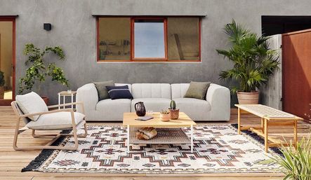 SHOP THE LOOK: Gwen Sectional, Aroba Square Coffee Table, Lane Outdoor Chair, Chula Outdoor Rug, Phoebe Outdoor Bench