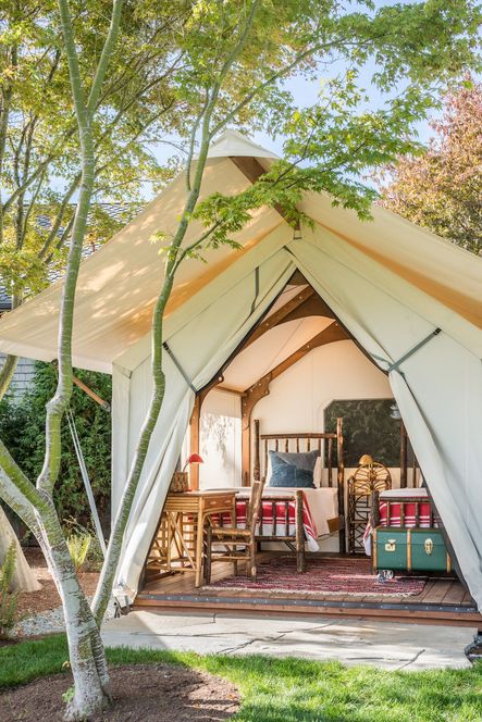 Taking risks and honing in on their skills, Hoedemaker Pfeiffer pulled out all the stops with this property. Demolishing half of the existing home, they made space for these luxurious tent bedrooms.Architecture & Interior Design by Hoedemaker Pfeiffer | Photography by Lisa Romerein & Andrew Giammarco | Project Whidbey Island Retreat