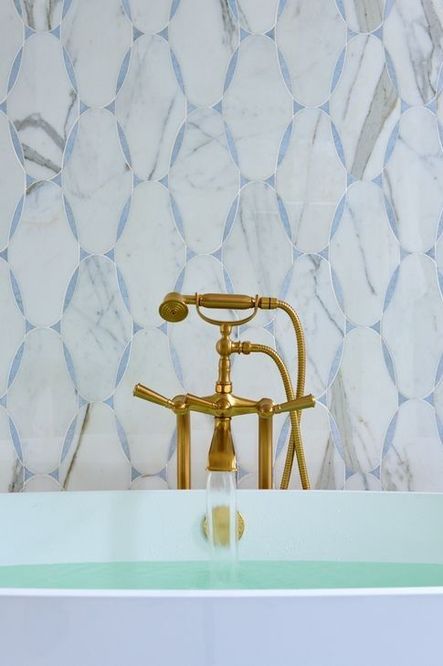 If you look closely, details like this old school tub faucet can be spotted throughout the home.