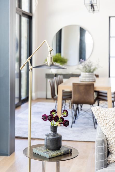 Design by Bodine White | Photography by Emily Sewell | SHOP THE LOOK: Douglas End Table, Mika Bottle Vase, Mid-Century Modern Floor Lamp, Kaz Textured Ivory/Beige Pillow