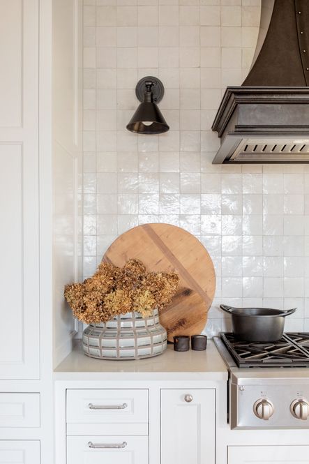 SHOP THE LOOK: Grid Ceramic Vase, Hazel Brown Salt & Pepper Set, Round Pine Charcuterie Board, Garden City Sconce