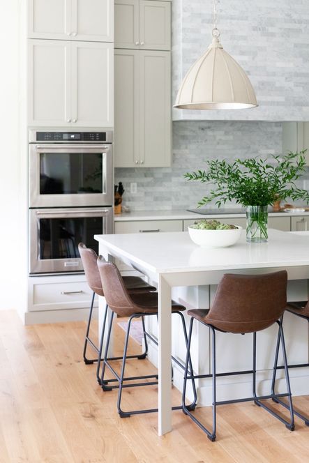 We love how the Fenchurch Pendant looks in this dreamy, neutral kitchen.