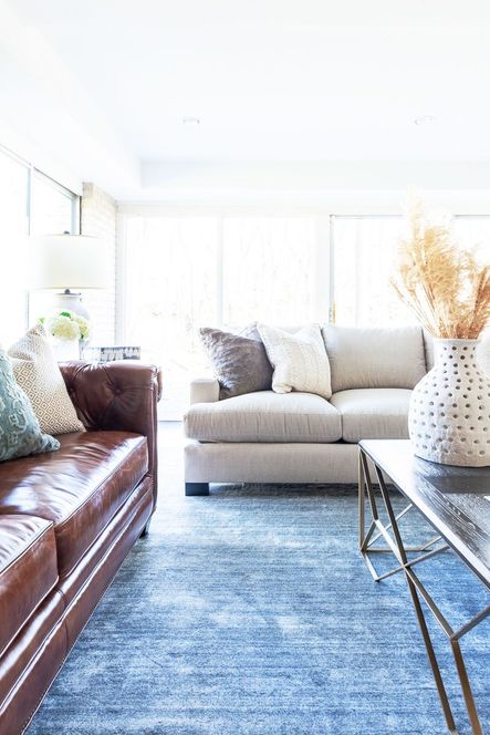 Our client’s have such a versatile style, it was important that we brought that through in this living room. One way we did this was by using 3 different styles for seating.